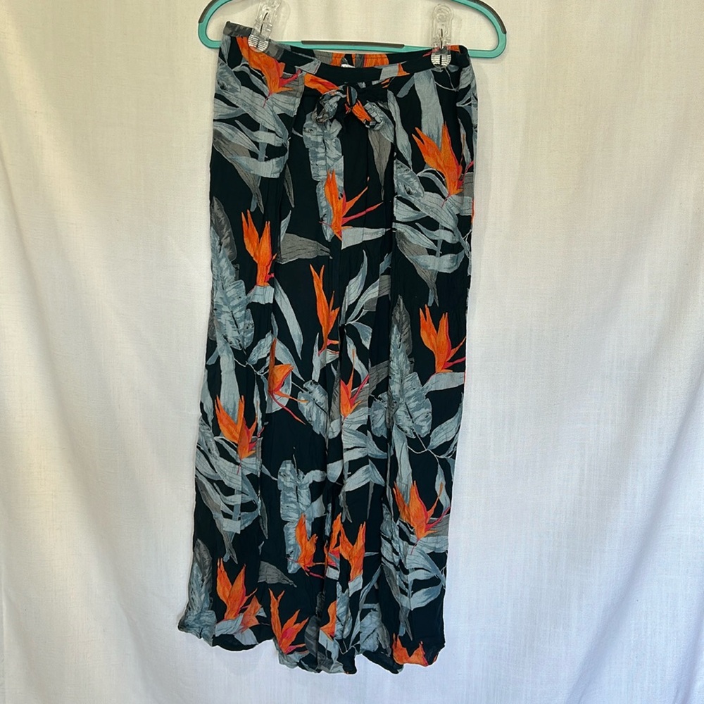 Patrons of Peace birds of paradise tropical pants. Open on side.